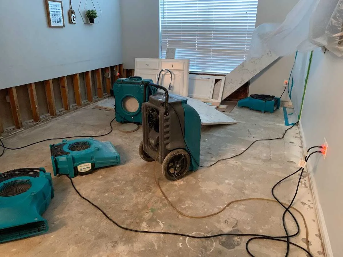 Dehumidifier in flood-cut room for Water Damage Restoration in Ferndale